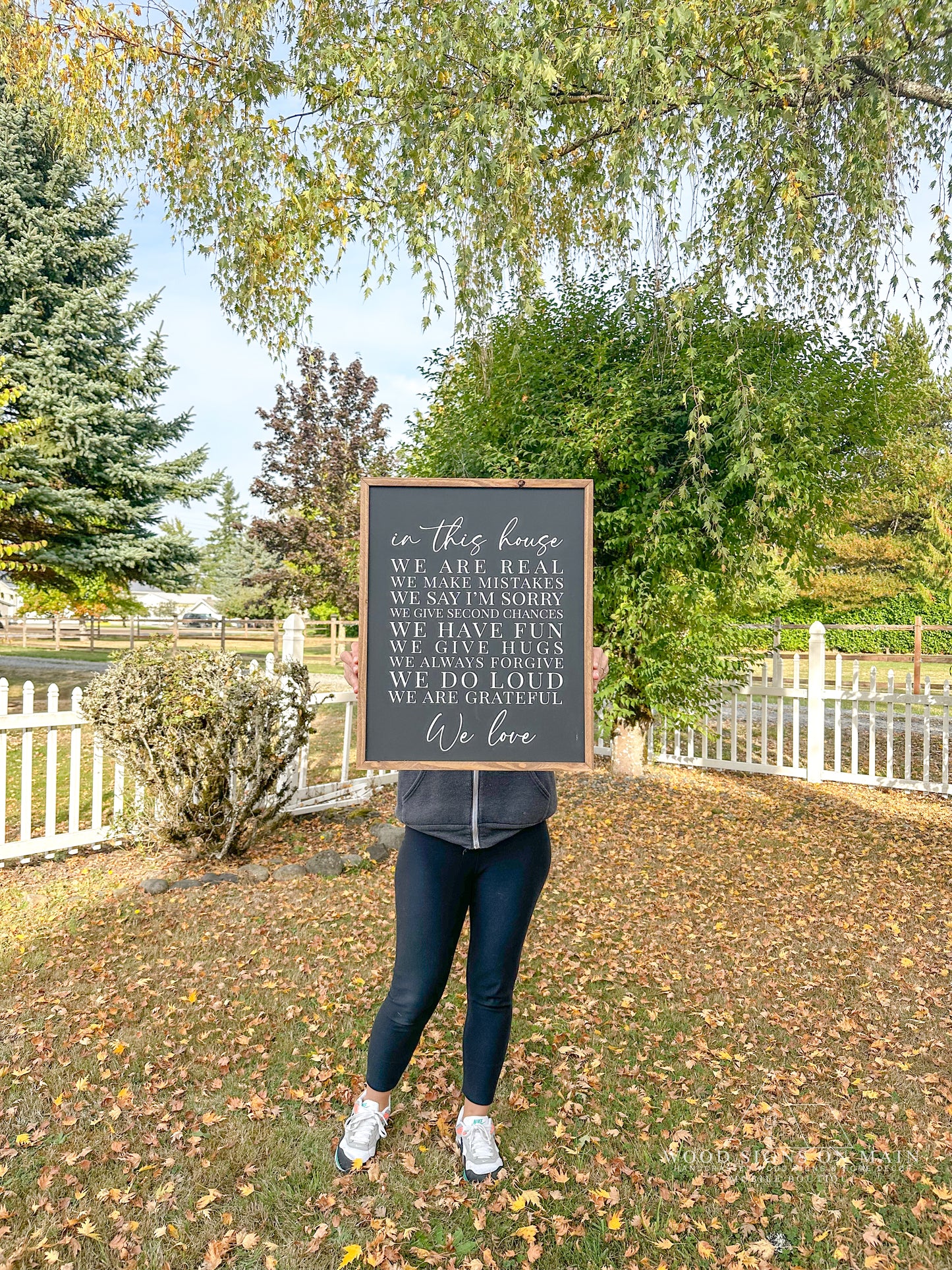 In this house hand-painted wood sign