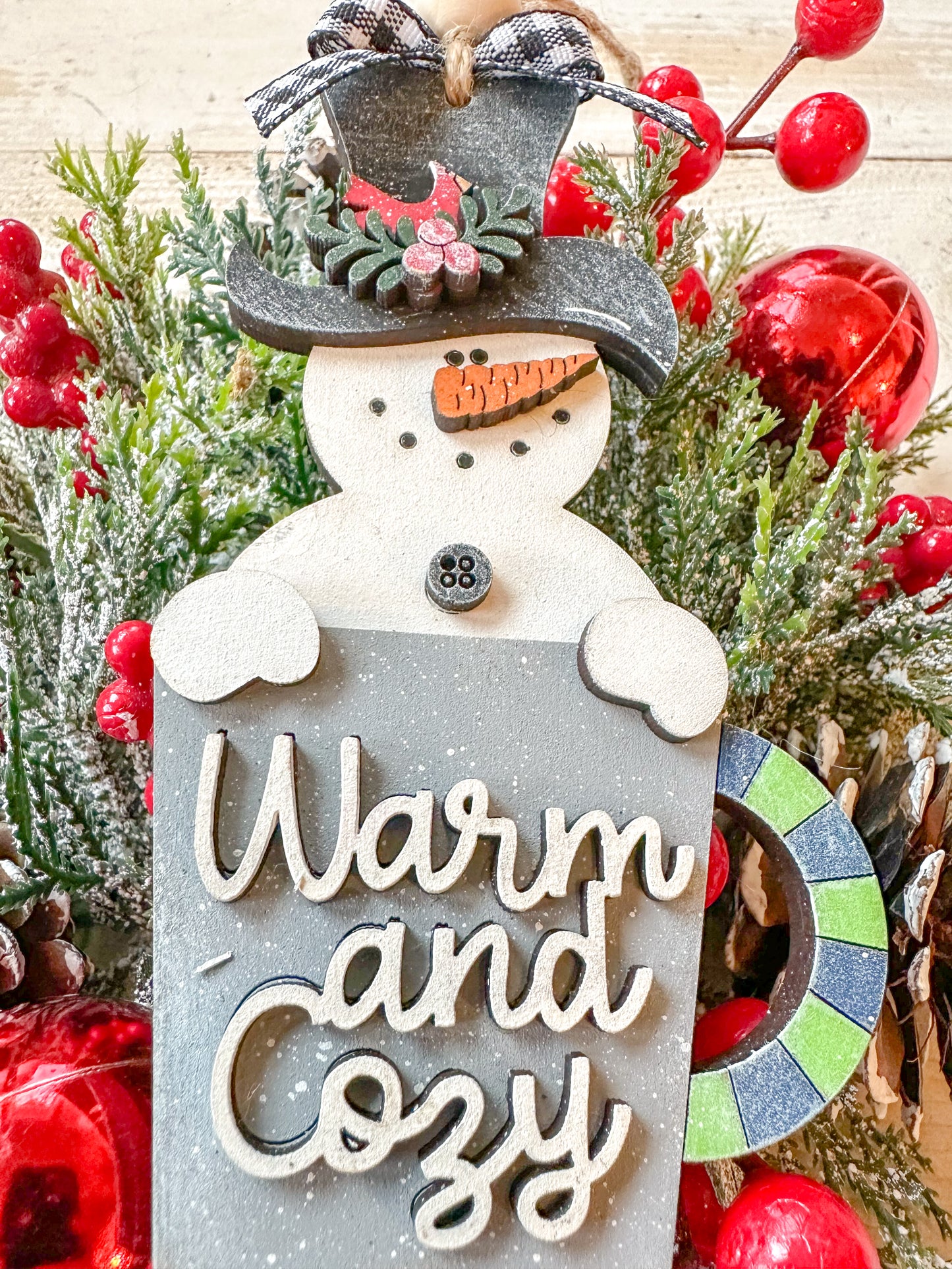 Warm and Cozy Snowman Ornament with Festive Mug
