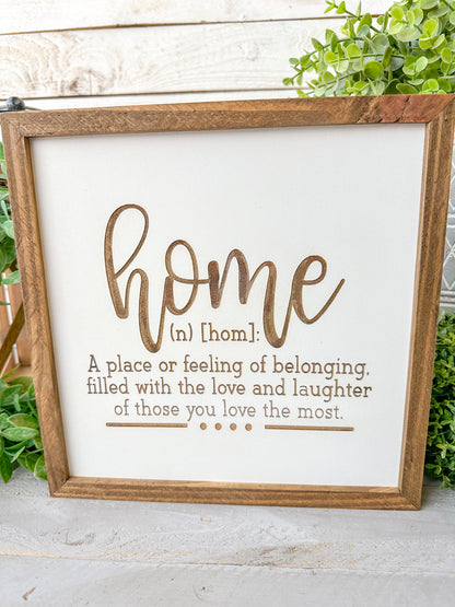 Home a place or filling of belonging, filled with love and laughter of those you love the most. Laser Engraved Wood Sign.