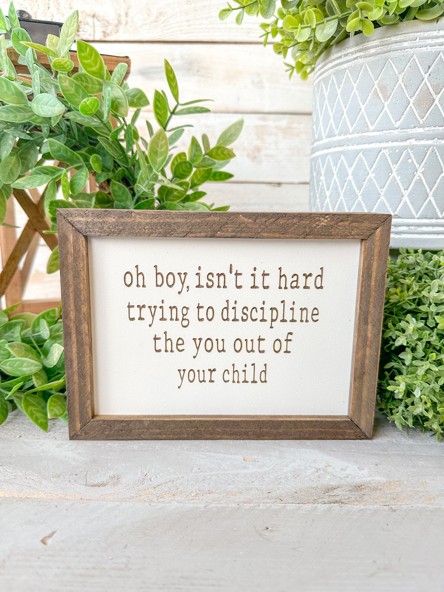 Oh boy, isn’t it hard trying to discipline the you out of your child. Laser engraved wood sign.
