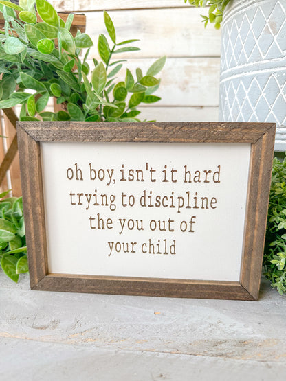 Oh boy, isn’t it hard trying to discipline the you out of your child. Laser engraved wood sign.