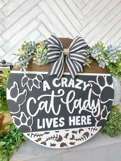 A crazy cat lady lives here 18’ door round
