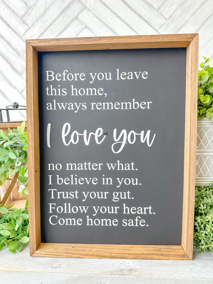 Before you leave this home, always remember I love you no matter what. I believe in you. Trust your gut. Trust your gut. Follow your your heart. Come home safe. Hand-painted wood sign.