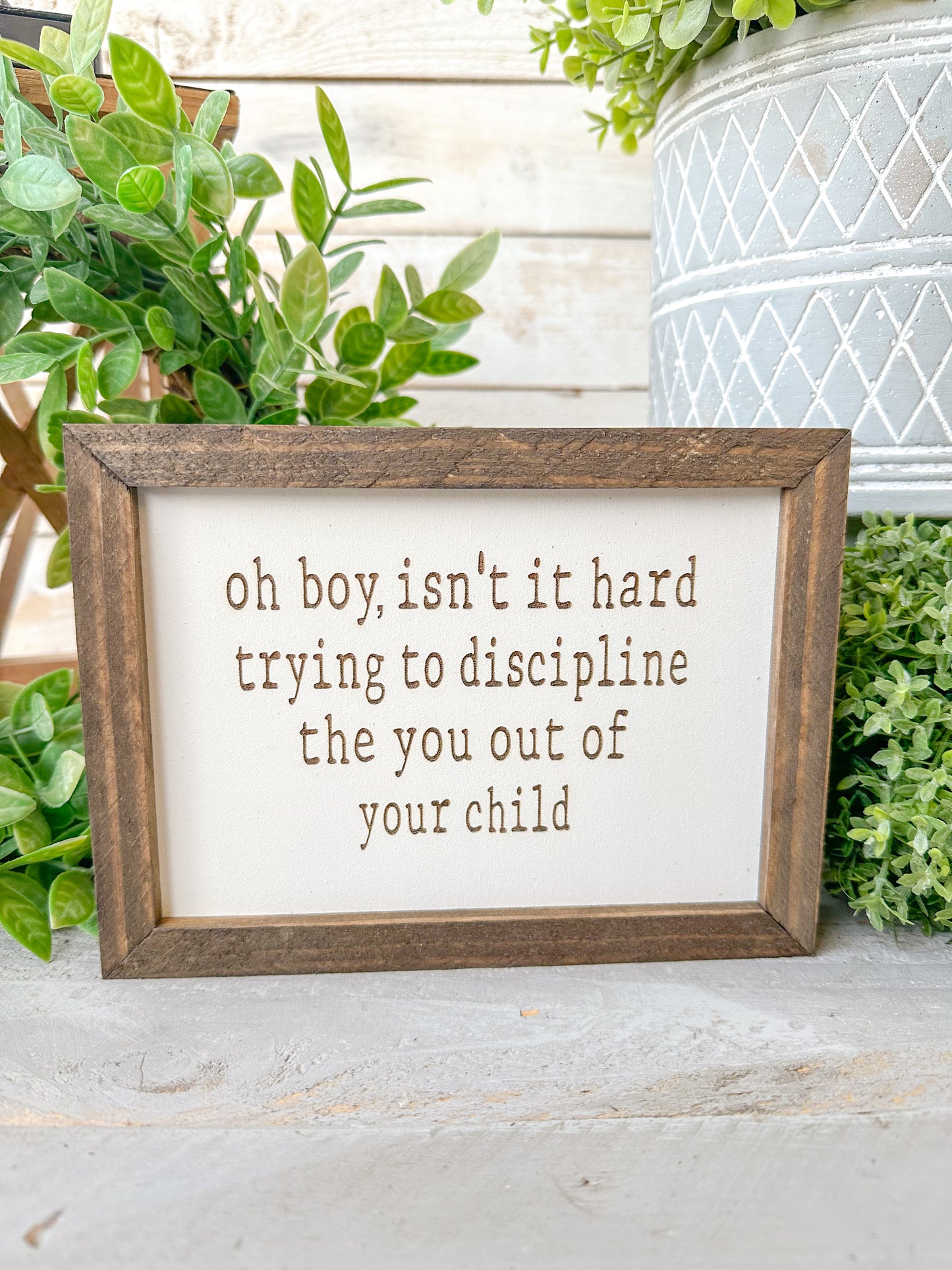 Oh boy, isn’t it hard trying to discipline the you out of your child. Laser engraved wood sign.