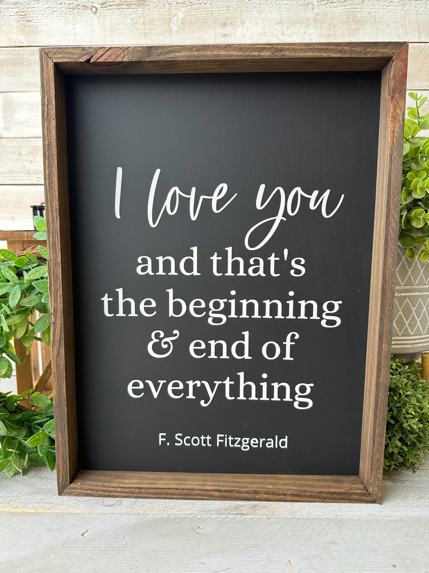 I love you and that’s the beginning & end of everything. Hand-painted wood sign.