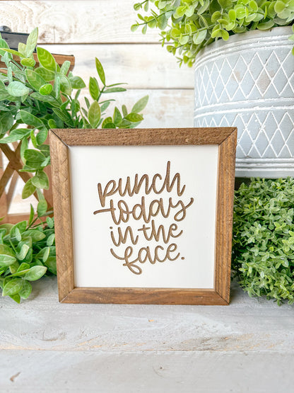 Punch today in the face. Laser Engraved Wood Signs.