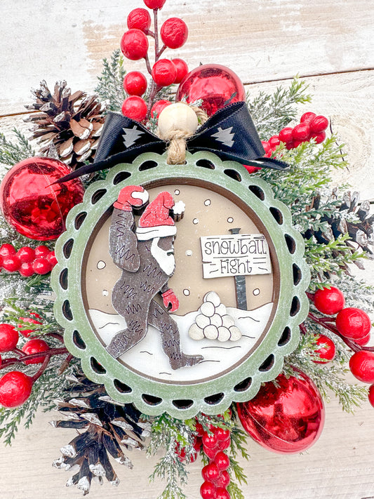 bigfoot snow ball fight ornament
