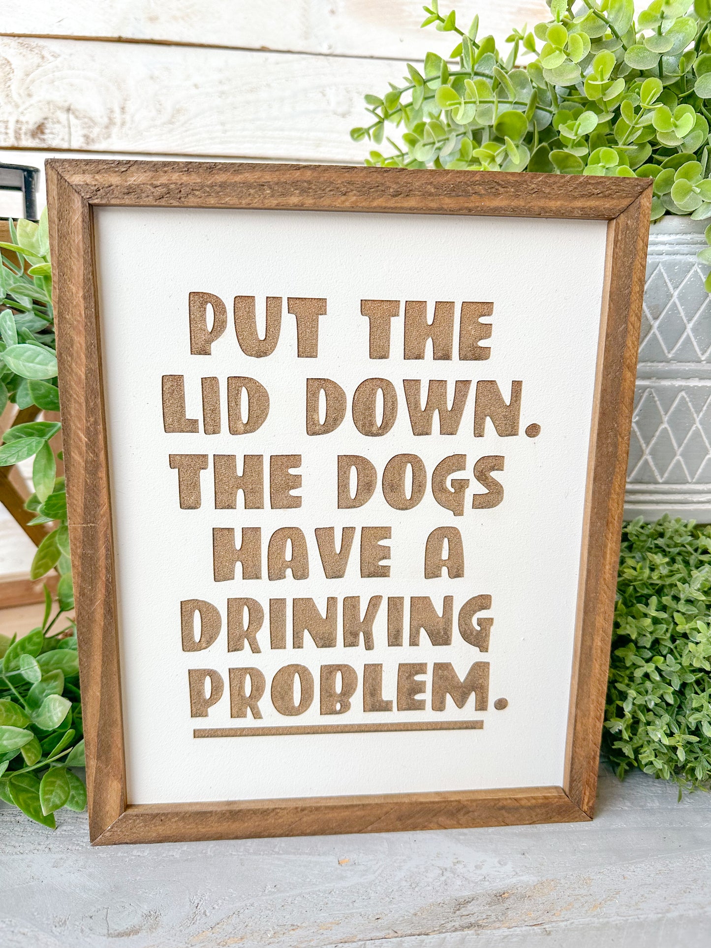 Put the lid down the dogs have a drinking problem. Laser engraved wood sign.