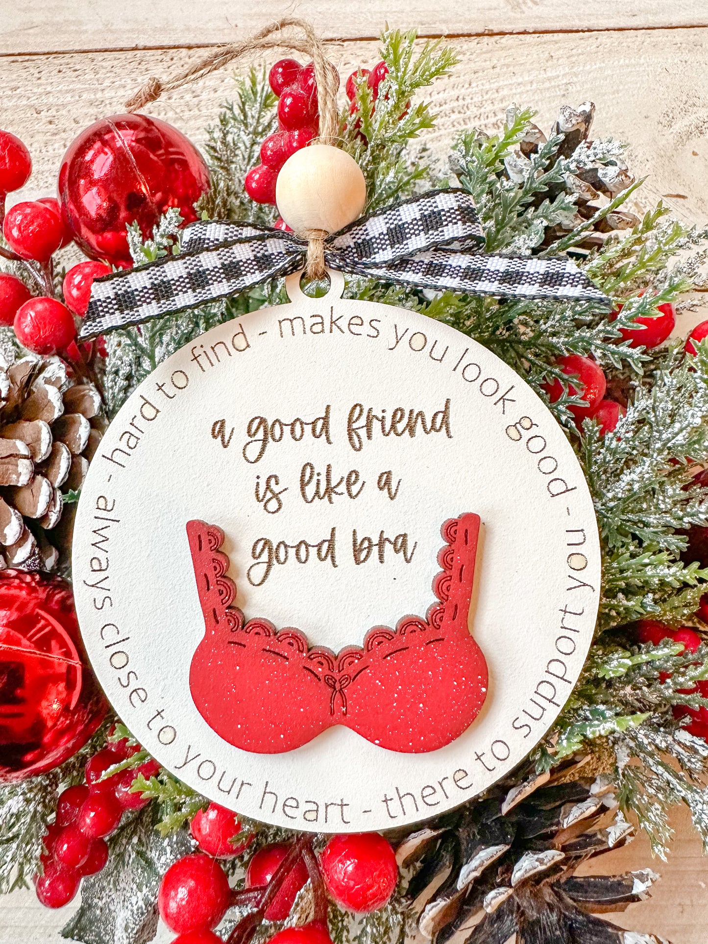 A good friend is like a bra ornament