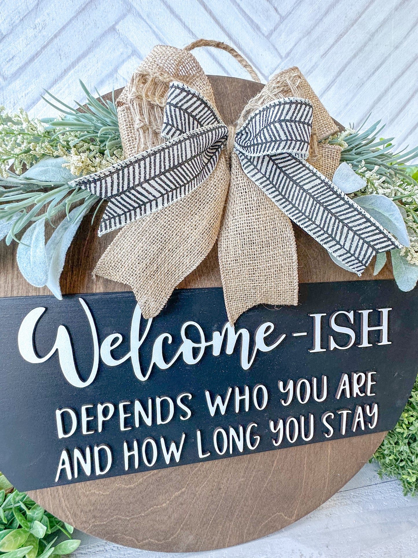 Funny Welcome-ish Sign - 18” Handcrafted Wood Round with Burlap Bow & Greenery