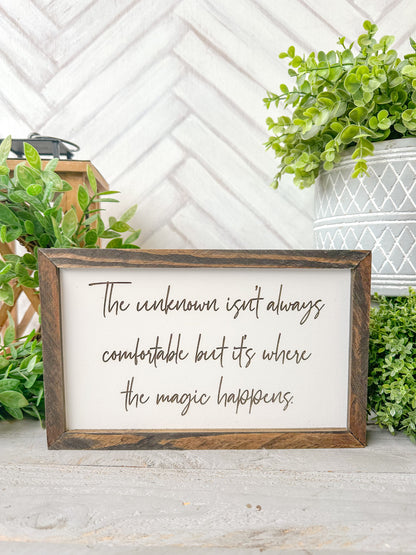 The Unknown isn’t always comfortable, but it’s where the magic happens laser engraved wooden sign