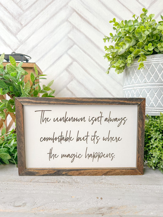 The Unknown isn’t always comfortable, but it’s where the magic happens laser engraved wooden sign