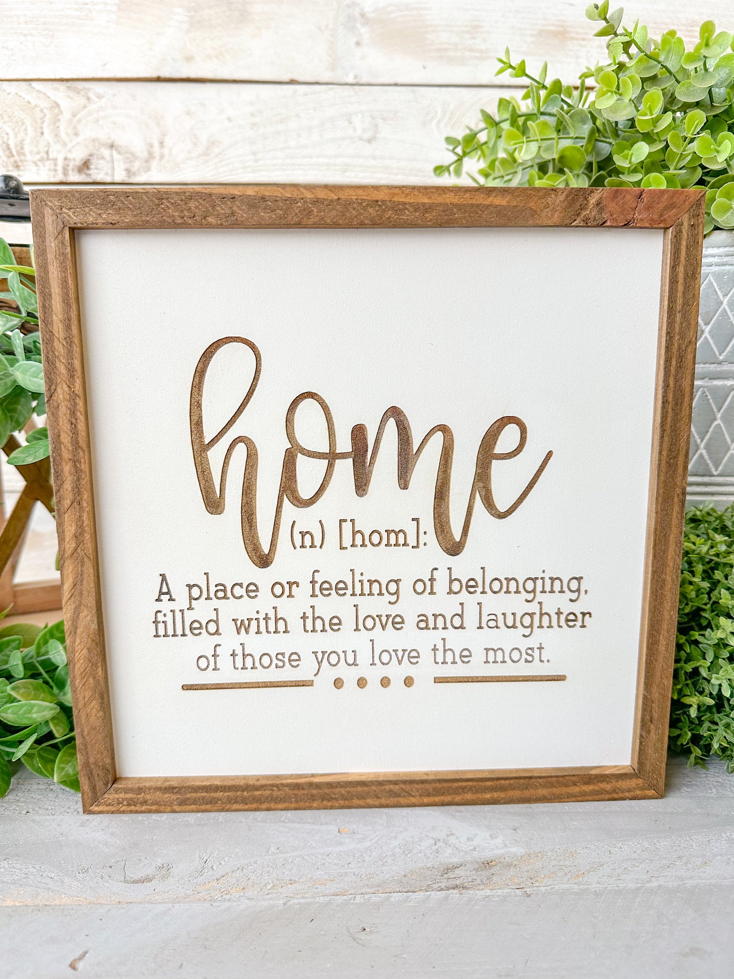 Home a place or filling of belonging, filled with love and laughter of those you love the most. Laser Engraved Wood Sign.