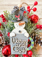 Warm and Cozy Snowman Ornament with Festive Mug