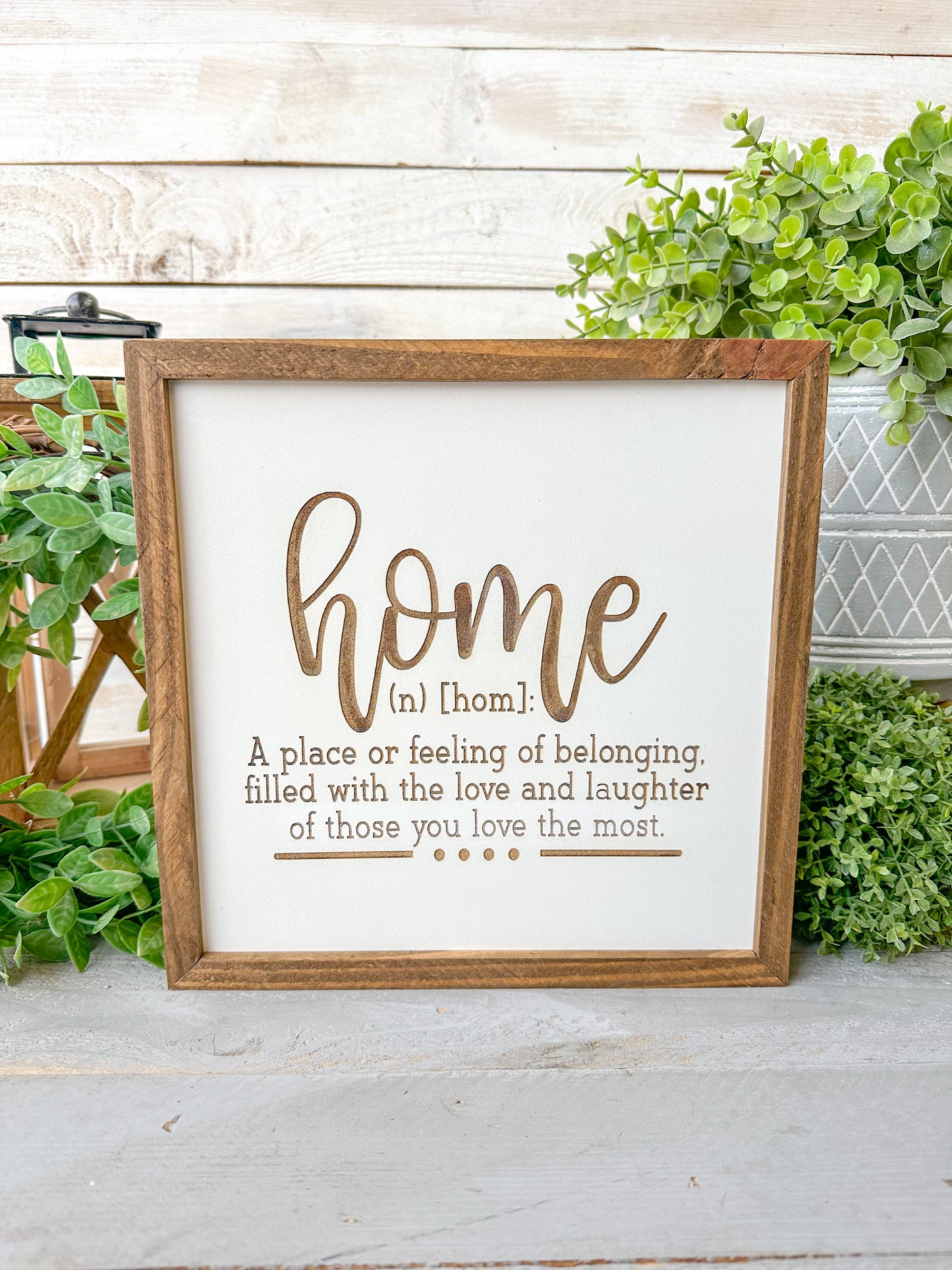Home a place or filling of belonging, filled with love and laughter of those you love the most. Laser Engraved Wood Sign.