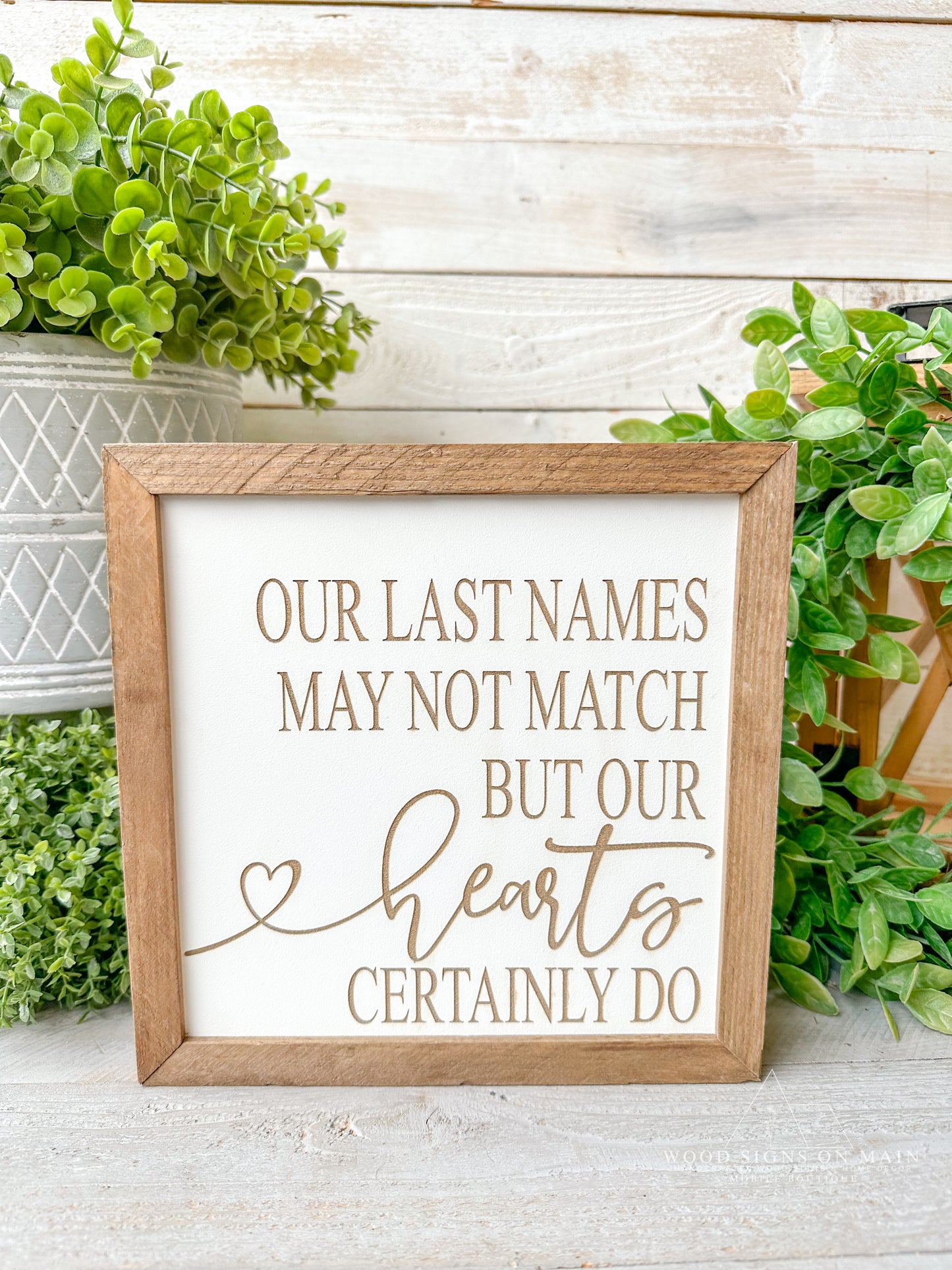Our last names may not match but our hearts certainly do. Laser engraved wood sign.