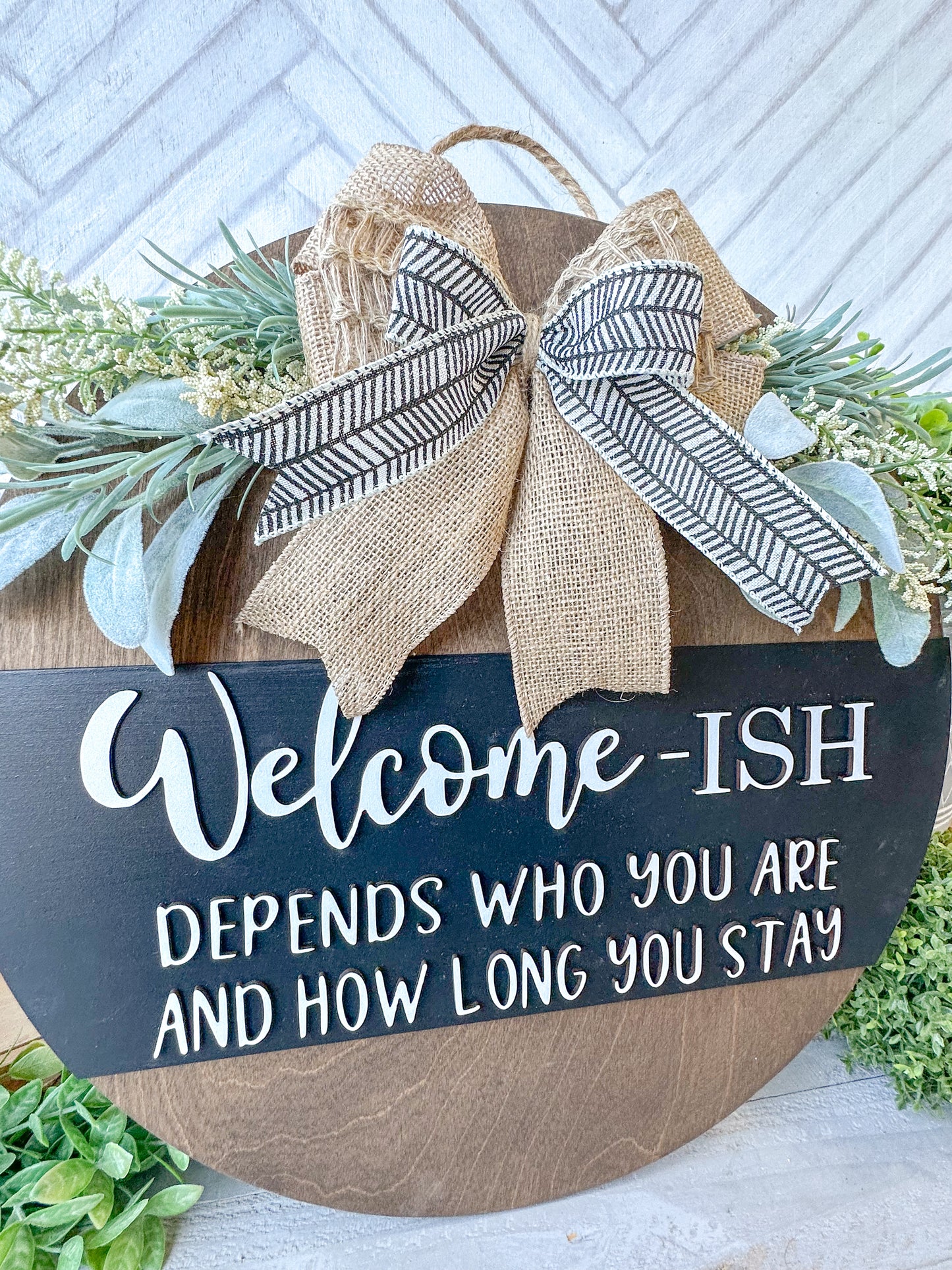 Funny Welcome-ish Sign - 18” Handcrafted Wood Round with Burlap Bow & Greenery