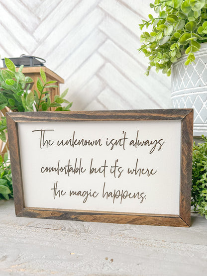 The Unknown isn’t always comfortable, but it’s where the magic happens laser engraved wooden sign