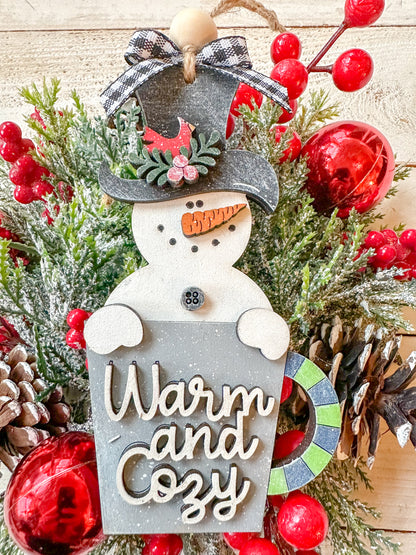 Warm and Cozy Snowman Ornament with Festive Mug