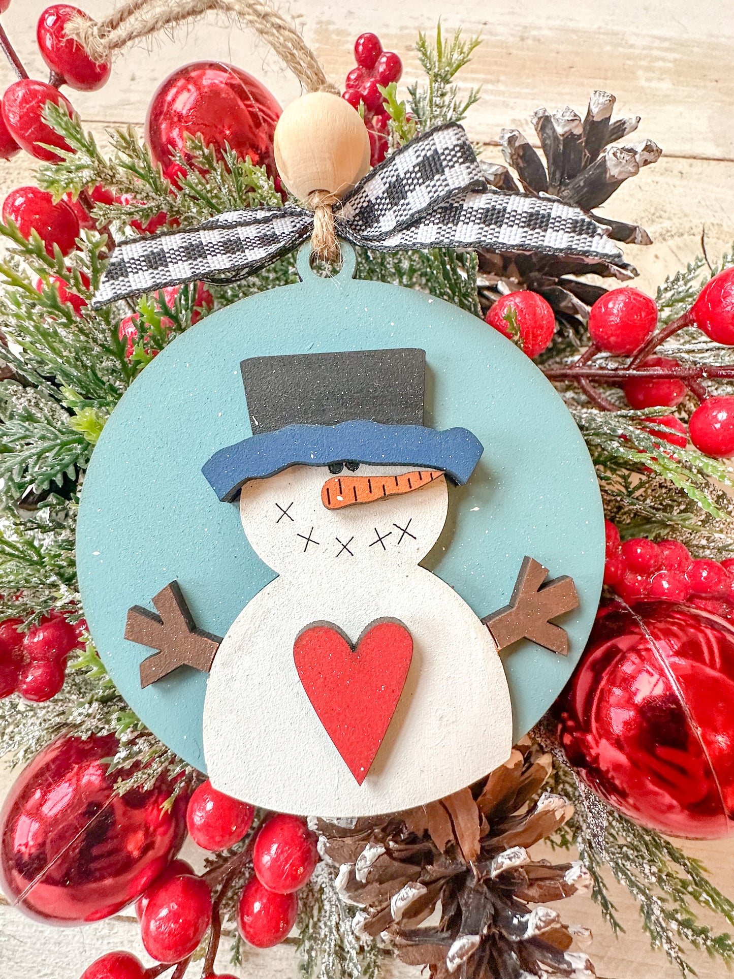 Handcrafted Snowman Ornament with Hat and Heart