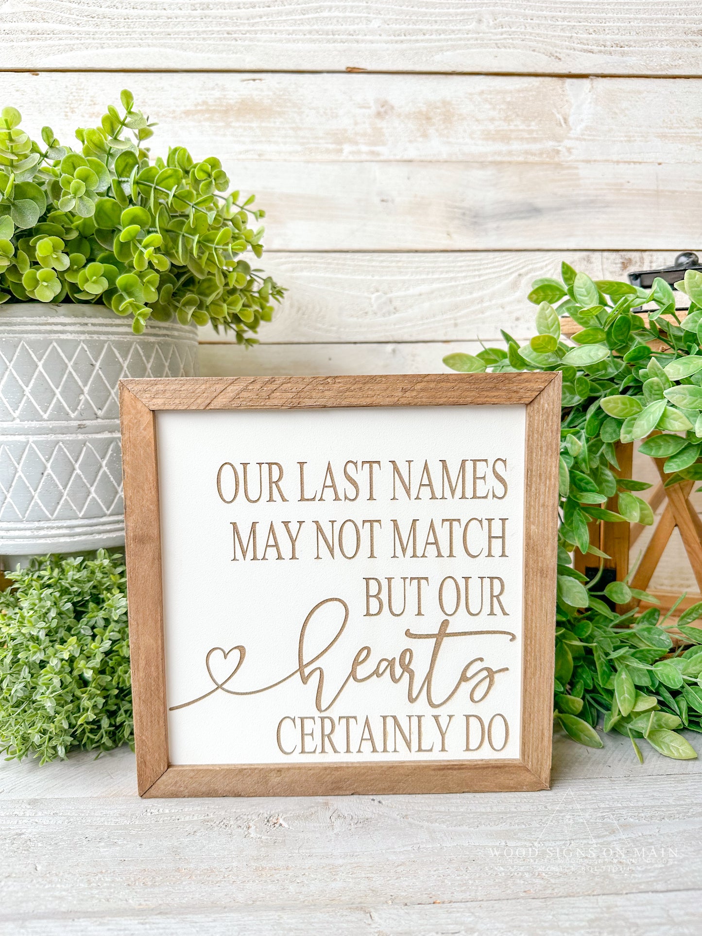 Our last names may not match but our hearts certainly do. Laser engraved wood sign.