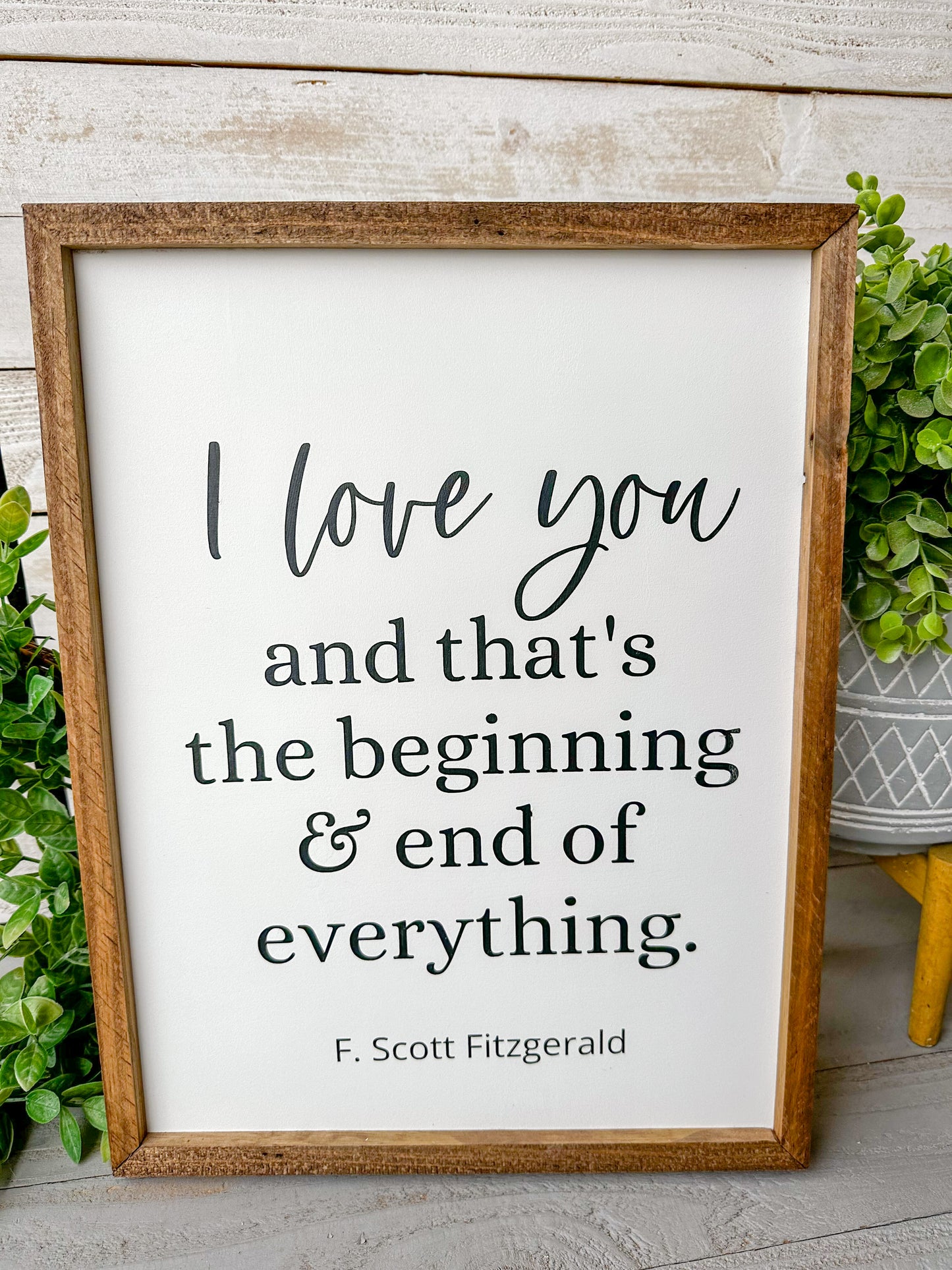 I love you and that’s the beginning & end of everything. Hand-painted wood sign.