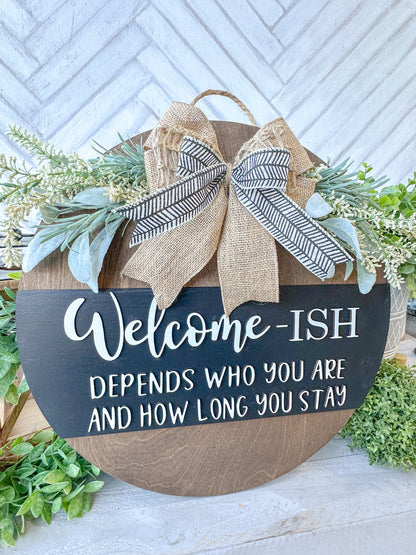 Funny Welcome-ish Sign - 18” Handcrafted Wood Round with Burlap Bow & Greenery