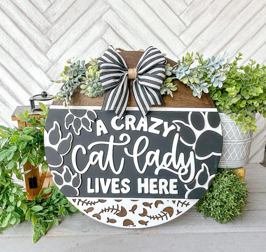 A crazy cat lady lives here 18’ door round