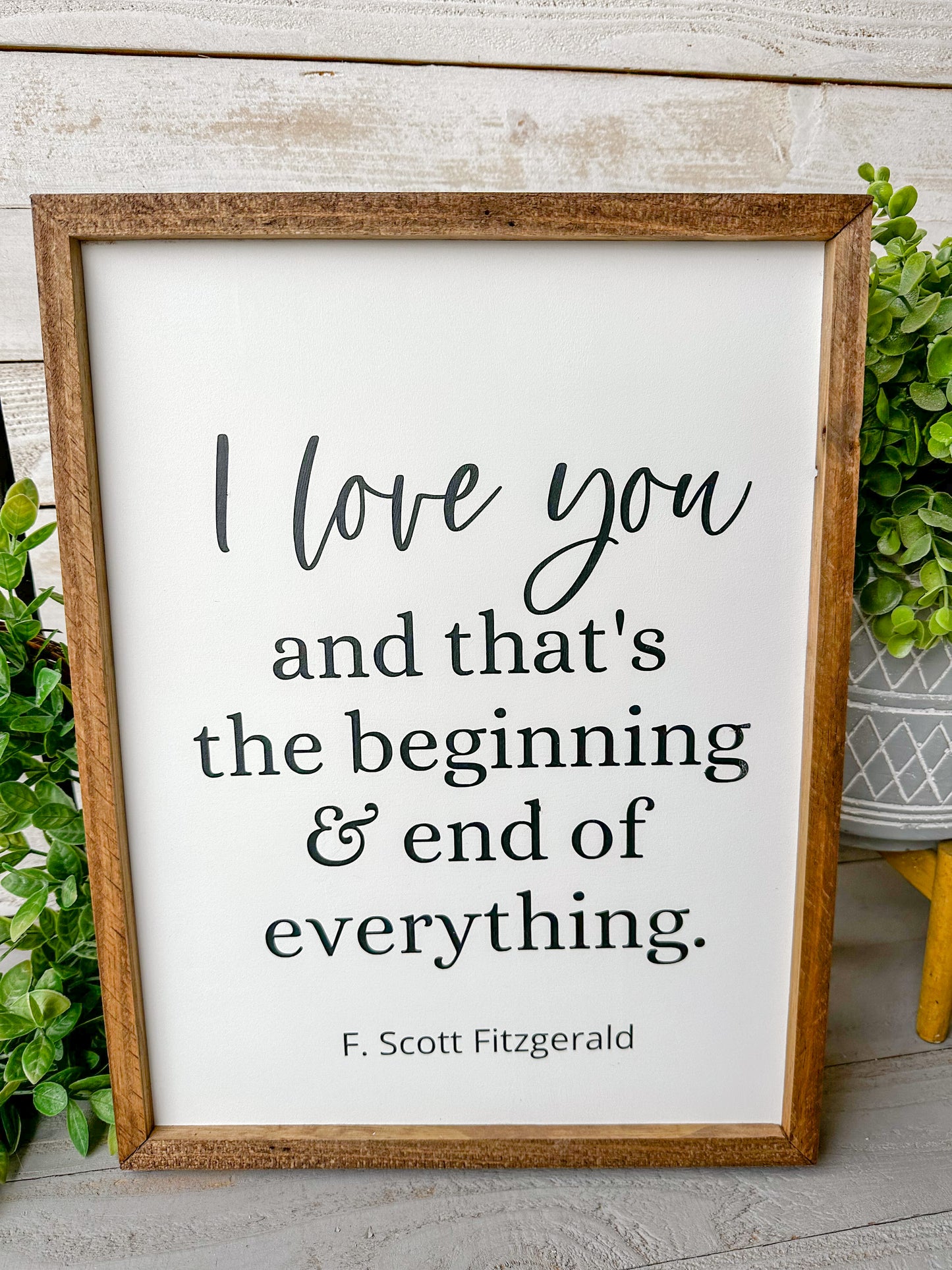 I love you and that’s the beginning & end of everything. Hand-painted wood sign.