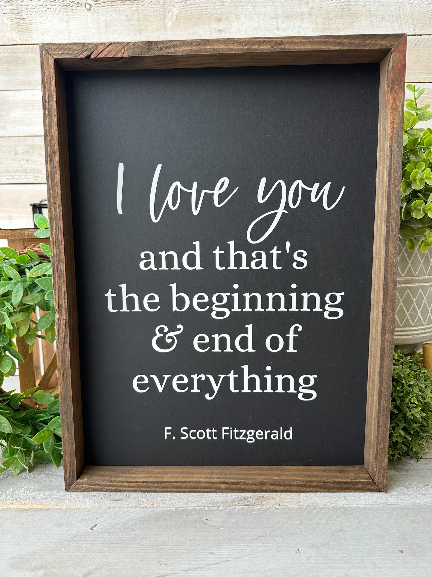I love you and that’s the beginning & end of everything. Hand-painted wood sign.