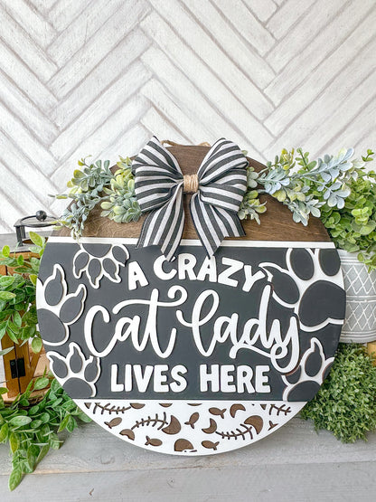 A crazy cat lady lives here 18’ door round