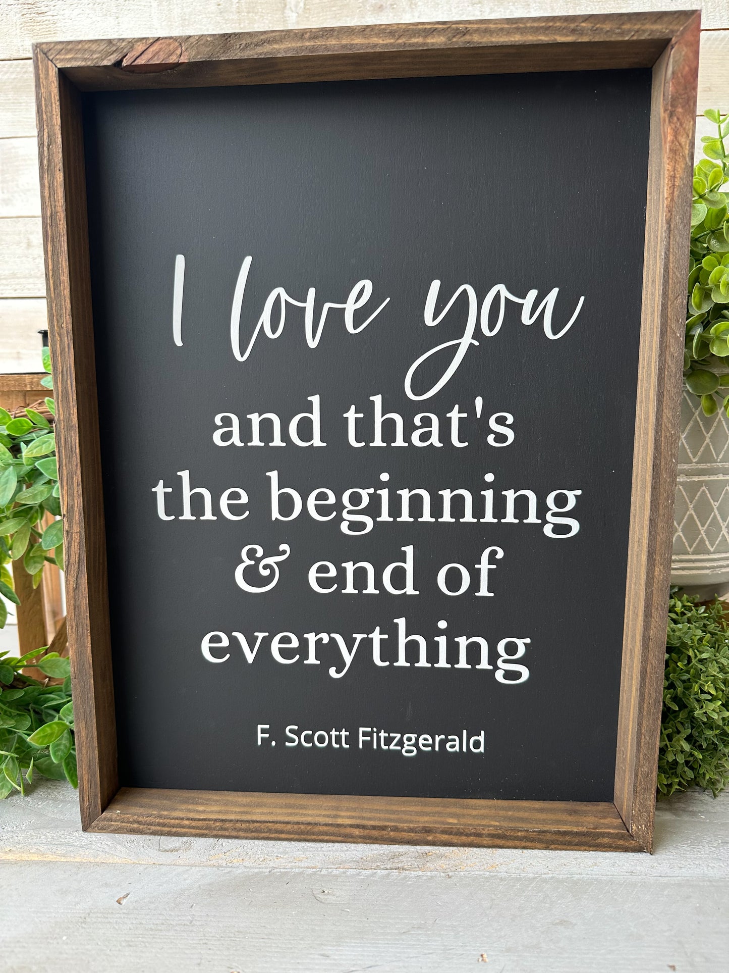 I love you and that’s the beginning & end of everything. Hand-painted wood sign.