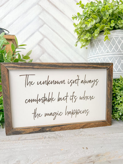 The Unknown isn’t always comfortable, but it’s where the magic happens laser engraved wooden sign