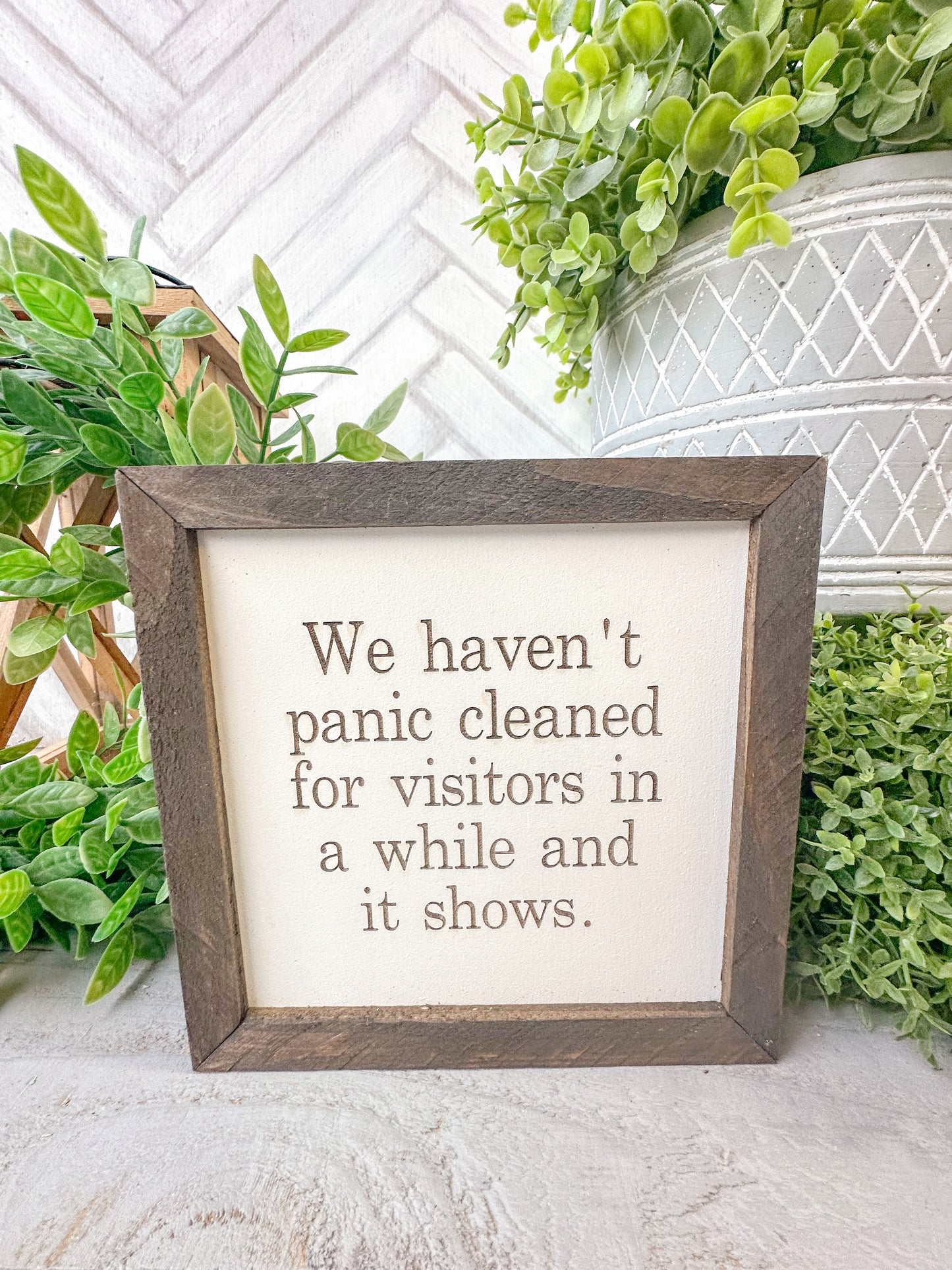 We have panic cleaned for visitors in a while and it shows. Laser engraved wood sign.