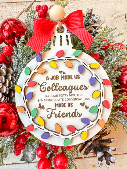 A job made us collogues but our potty mouths made us friends ornament