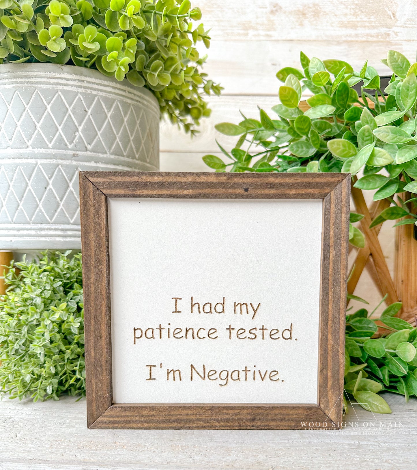 I had my patience tested. I'm negative. Laer engraved wood sign
