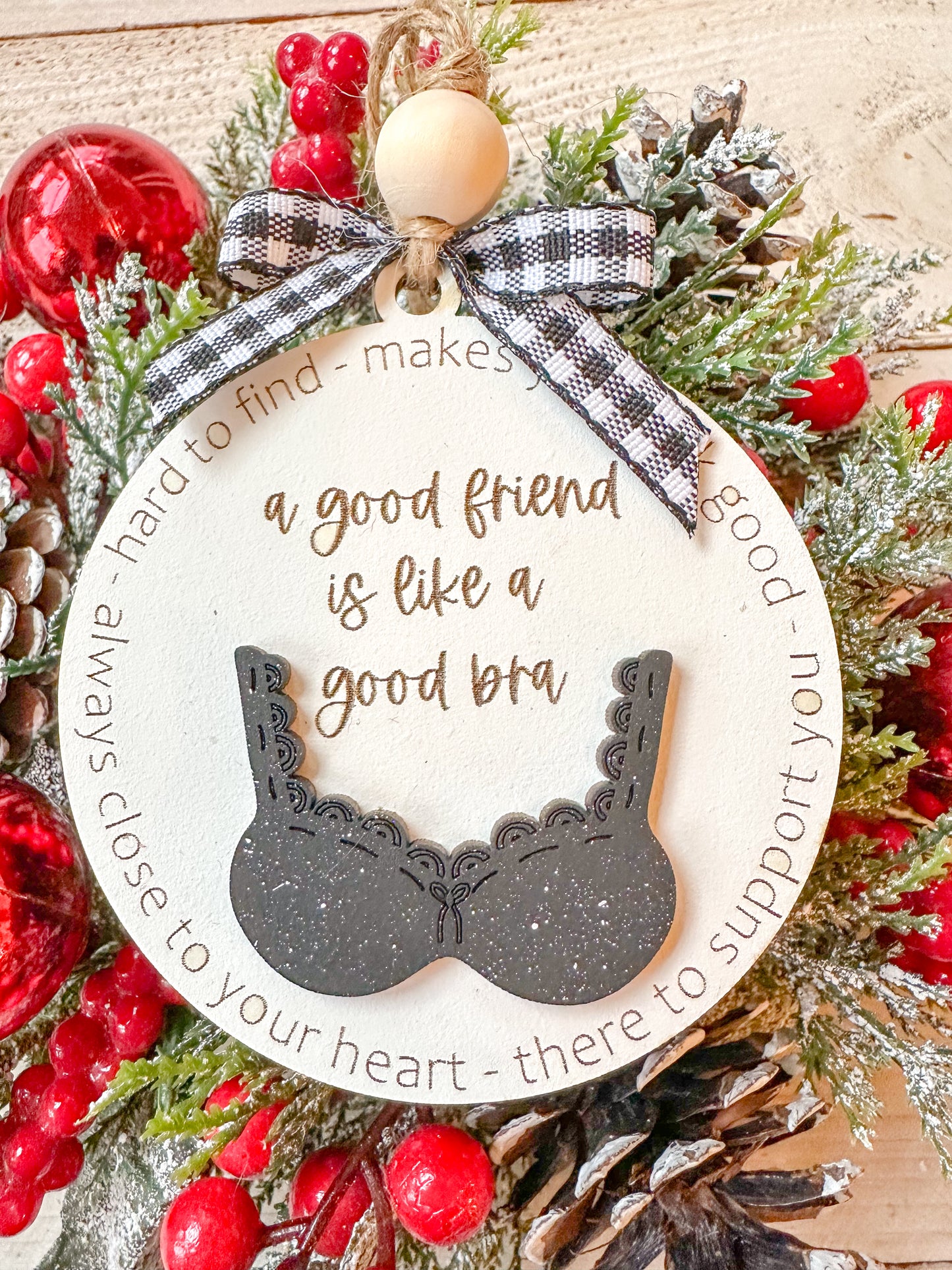 A good friend is like a bra ornament