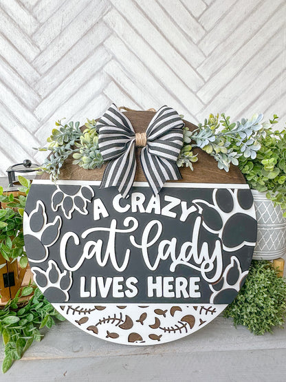 A crazy cat lady lives here 18’ door round