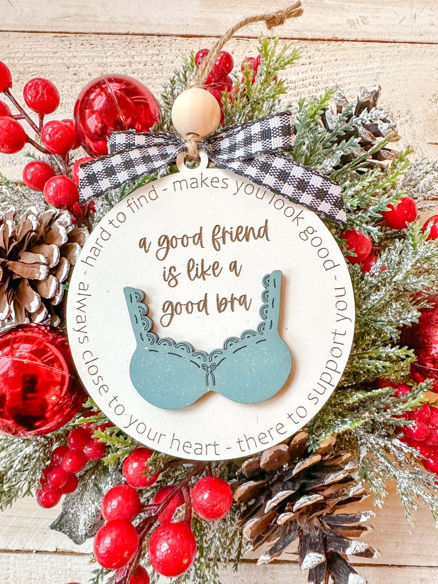 A good friend is like a bra ornament