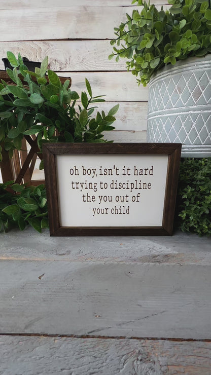 Oh boy, isn’t it hard trying to discipline the you out of your child. Laser engraved wood sign.