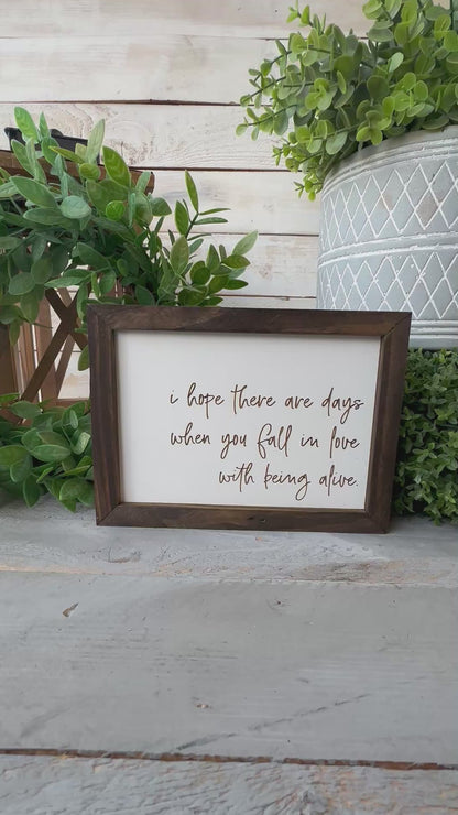 I hope there are days when you fall in love with being alive. Laser engraved wood sign.