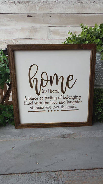 Home a place or filling of belonging, filled with love and laughter of those you love the most. Laser Engraved Wood Sign.